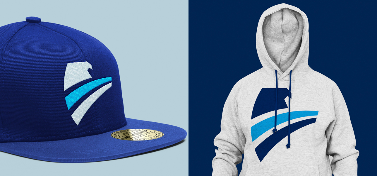Visualización del símbolo de HTA aplicado en una gorra azul y una sudadera gris.
